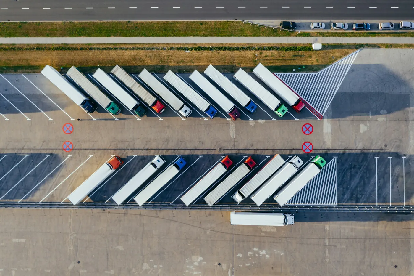 Aerial view of trucks parked in a logistics yard