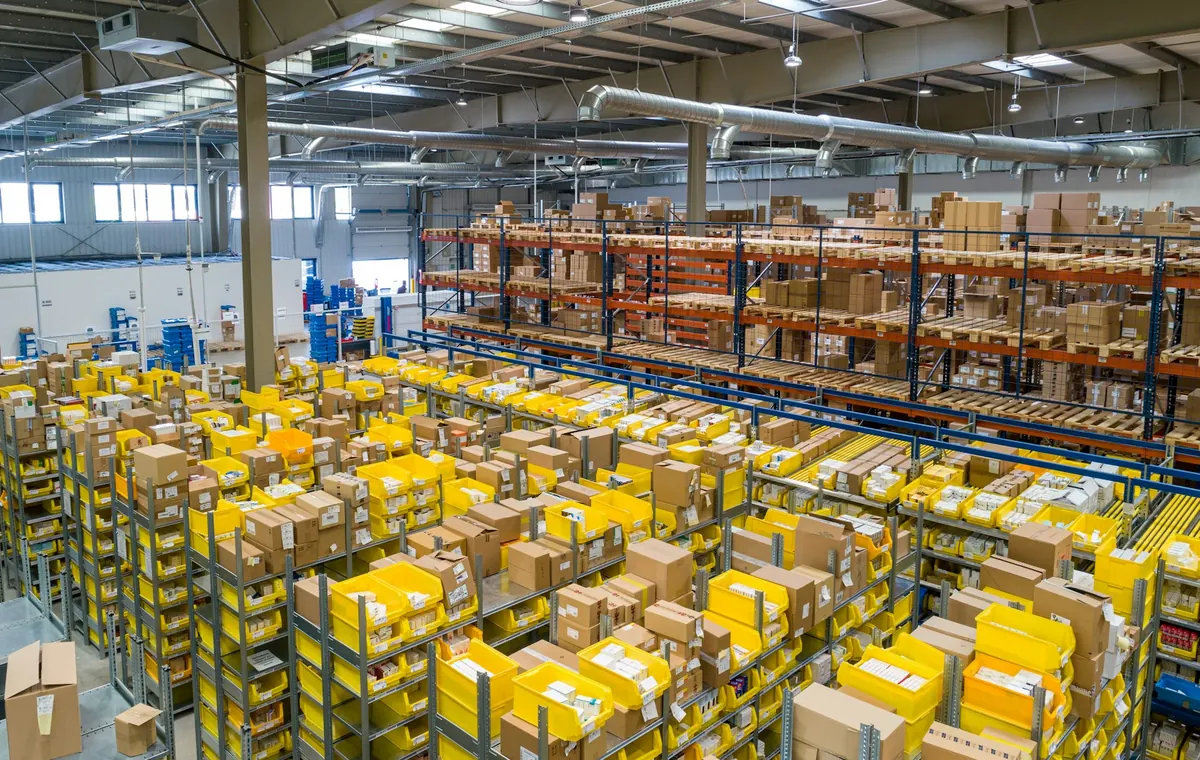Aisles of shelving and pallet racks in a distribution warehouse